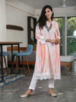Set Of Orange Shibori Print Loose Fit Kurta With Pleats On The Sides Detailed With A Broad Lace At The Bottom Hem And Sleeve And White Cotton Straight Pants With Lace Inserts