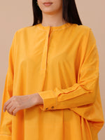 Yellow Cotton Loose Fit Kurta With Contrast Stitch Paired With Straight Pants With Lace Inserts.