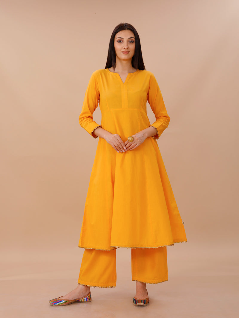 Yellow Cotton A Line Kurta With Loose Pants With Goldan Gota Details