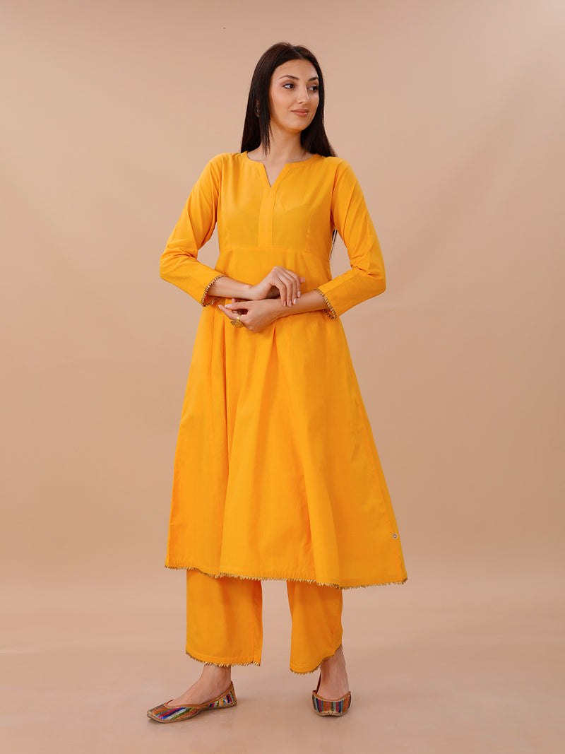 Yellow Cotton A Line Kurta With Loose Pants With Goldan Gota Details