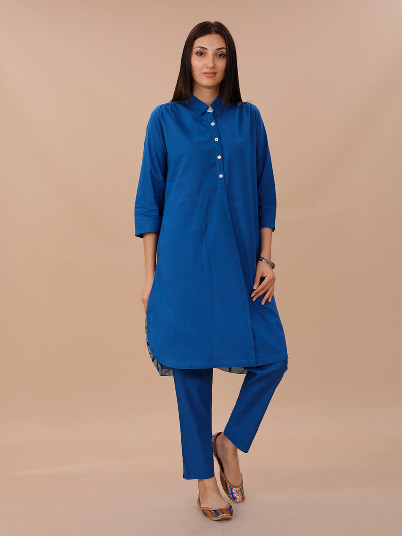 Blue Cotton Kurta With Pockets And Shibori Inserts At Neck Band And Bottom Hem Paired With Straight Pants .