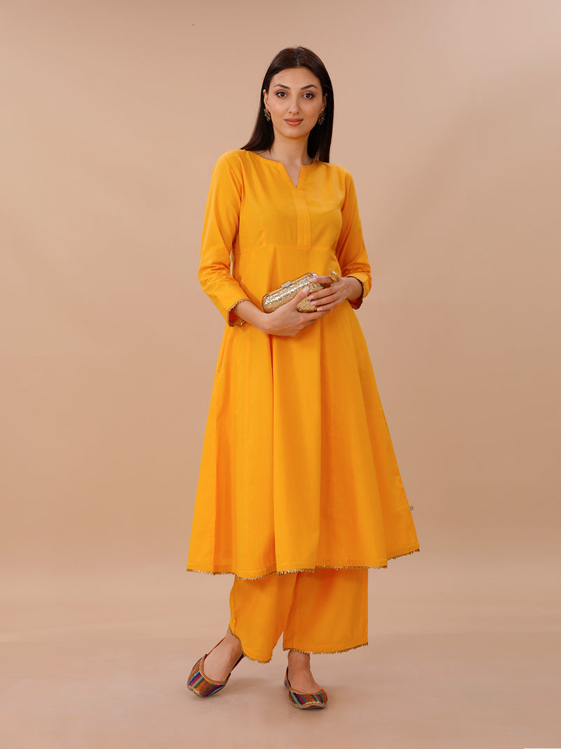 Yellow Cotton A Line Kurta With Loose Pants With Goldan Gota Details