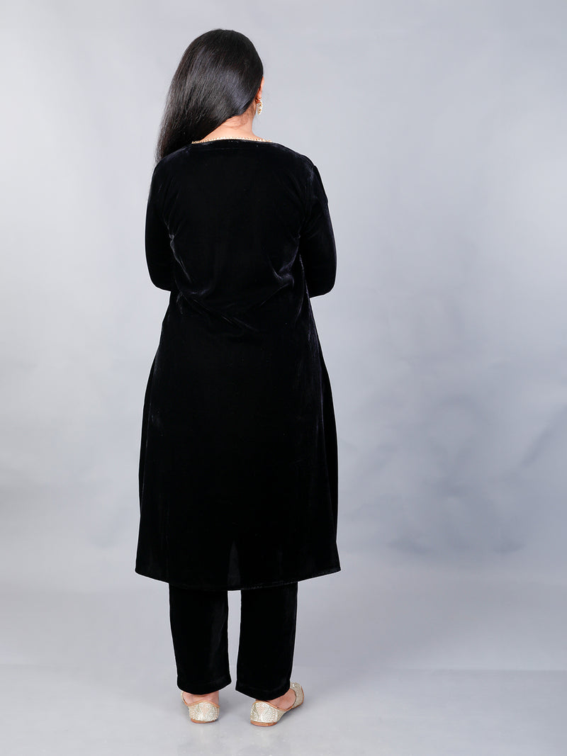Black velvet Aline kurta with pockets and gota embellishment with matching straight pants. Set of 2.