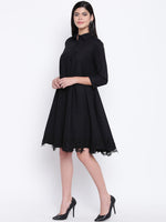 Women's black cotton flowy dress with black lace at bottom hem