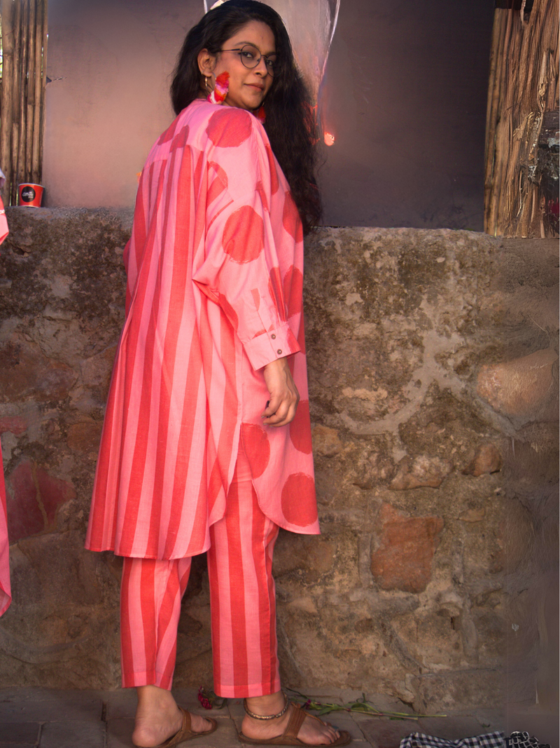 Loose fit kurta in pink and red polka amd stripe combo paired with stripe pants