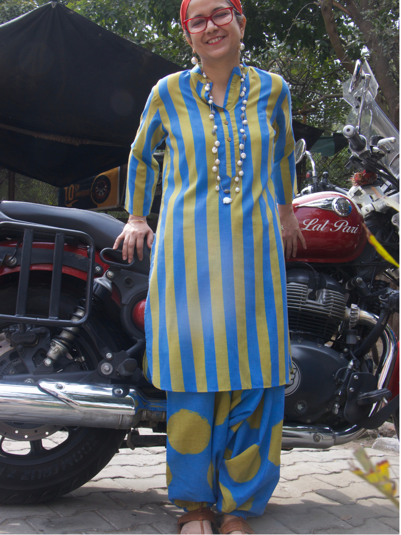 Coord set of green nd blue stripe kurta paired with polka harem pants in the same color.