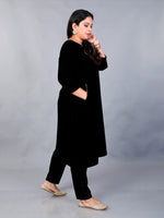Black velvet Aline kurta with pockets and gota embellishment