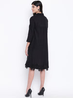 Women's black cotton flowy dress with black lace at bottom hem