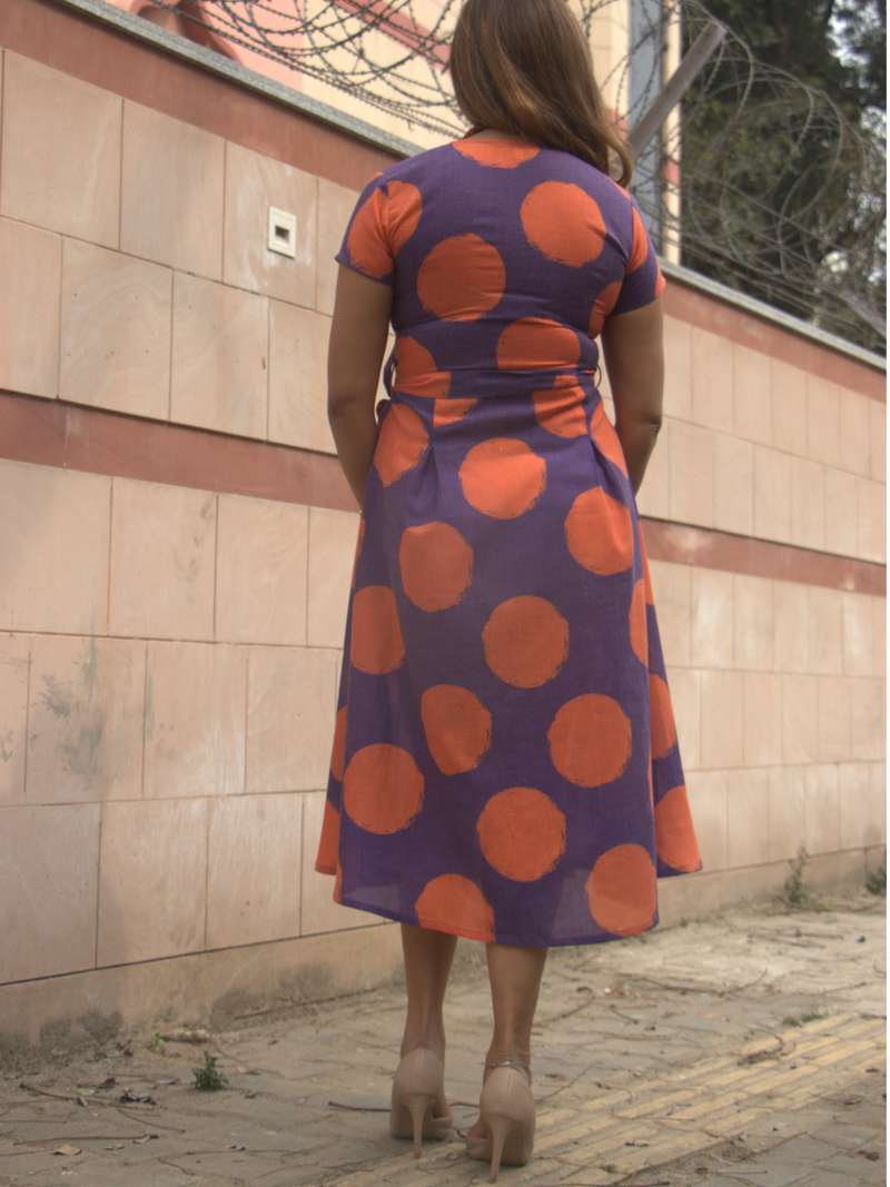 Orange and purple fit and flare dress with a belt