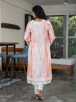Set Of Orange Shibori Print Loose Fit Kurta With Pleats On The Sides Detailed With A Broad Lace At The Bottom Hem And Sleeve And White Cotton Straight Pants With Lace Inserts