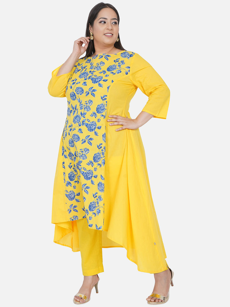 Curve Cotton Yellow Assymetrical Kurta With Printed Centre Panel Paired With Tapered Yellow Cotton Solid Pants-Kurta Set-Fabnest