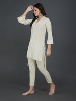 Off white cotton flex with pleats and lace work at neck and sleeve hem high low kurta ONLY-Kurta-Fabnest