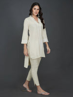 Off white cotton flex with pleats and lace work at neck and sleeve hem high low kurta ONLY-Kurta-Fabnest