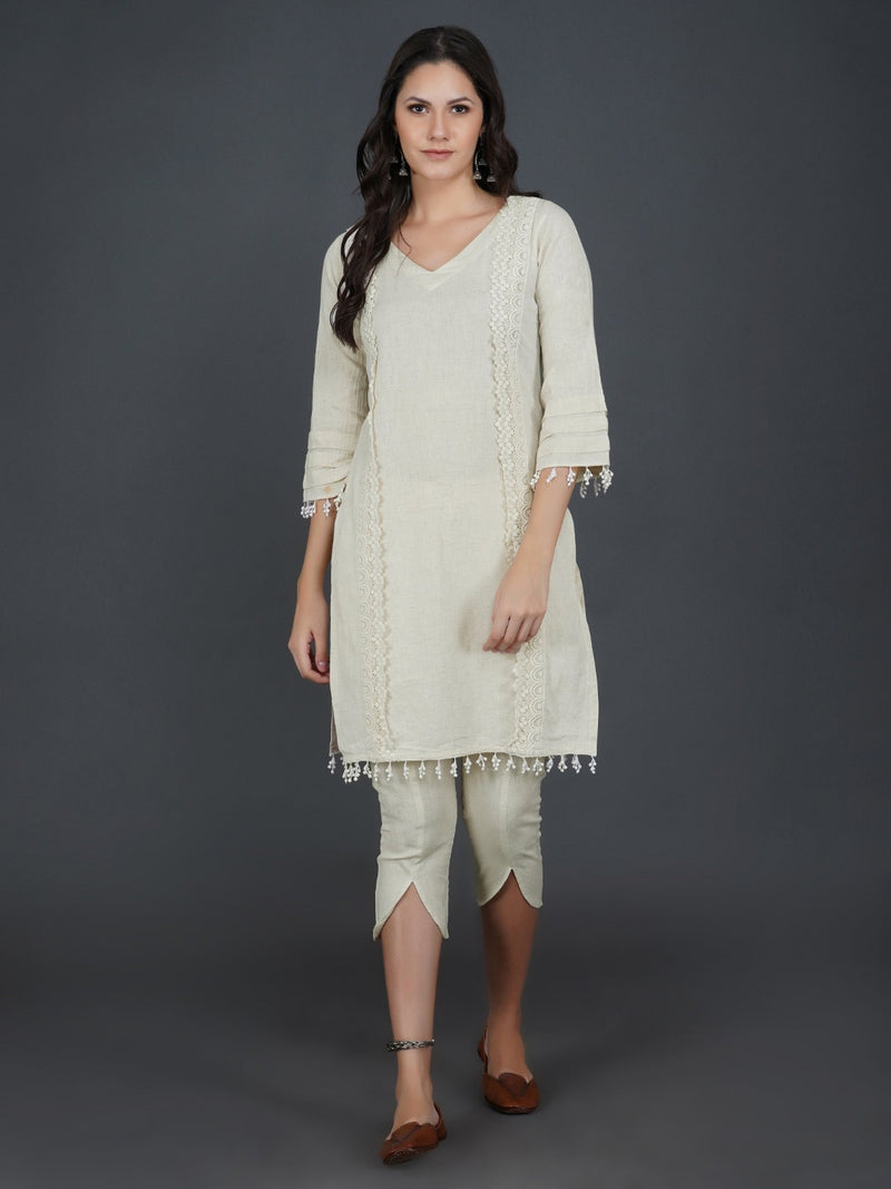 Off white cotton flex with lace work on princess seam and tiered sleeves kurta ONLY-Kurta-Fabnest